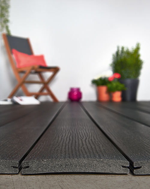 Bombierte WPC-Dielen für die Terrasse (im Querschnitt, mit sichtbarer Wölbung) von HolzLand Beese in Unna Bombierte WPC-Dielen für die Terrasse (im Querschnitt, mit sichtbarer Wölbung) von HolzLand Beese in Unna